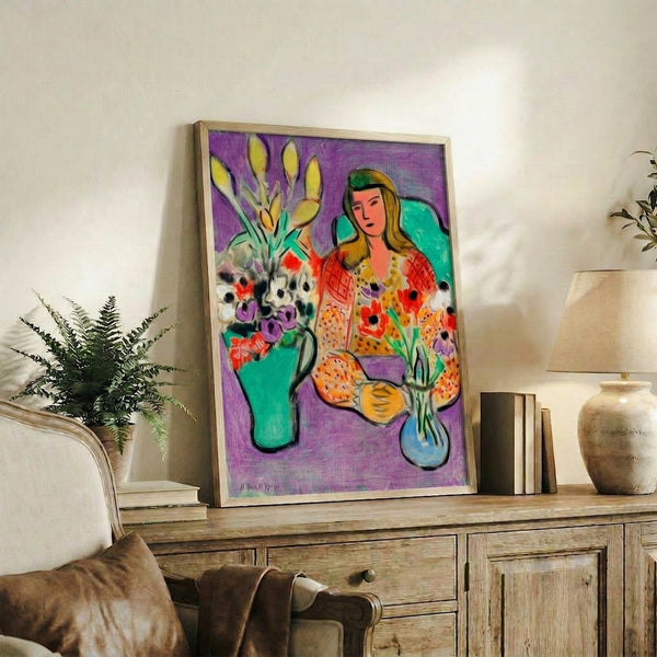Matisse-inspired framed poster of a girl with anemone flowers in vibrant watercolor on a striking purple ground.