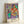 Elegant framed poster showcasing a whimsical girl figure with delicate red and purple anemones in soft, abstract modern art style.