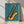 Minimalist line art saxophone in golden yellow and teal blue with black linework, creating a bold, jazzy aesthetic on a framed poster.