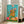 Coquette-inspired floral poster showcasing a snail and blooming flowers in luxurious gold, coral, and turquoise tones against soft cream background, displayed as framed wall art.