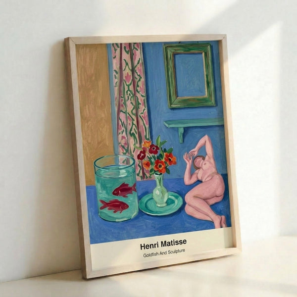 Cheerful abstract composition with a stylized goldfish and sculptural shape rendered in bright blue, coral, and green on white background, framed Matisse-inspired print.