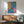 Vibrant modern framed poster with a stylized goldfish and abstract sculpture in bright blue, coral, green, and ochre, decorative minimalist artwork.