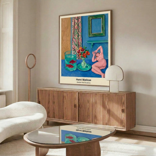 Playful abstract framed print showcasing a colorful goldfish and sculptural form in bold blues, coral, and green hues, contemporary Matisse-inspired wall art.