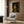 Wall art print depicting a contemplative man's portrait in warm gold and shadowy ochre palette, rendered in Impressionist style with dark academia appeal.