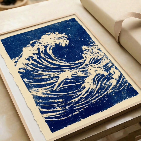 Traditional Japanese print in cream and indigo tones depicting an enormous foaming wave with majestic mountain scenery, embodying dynamic power and serene beauty.