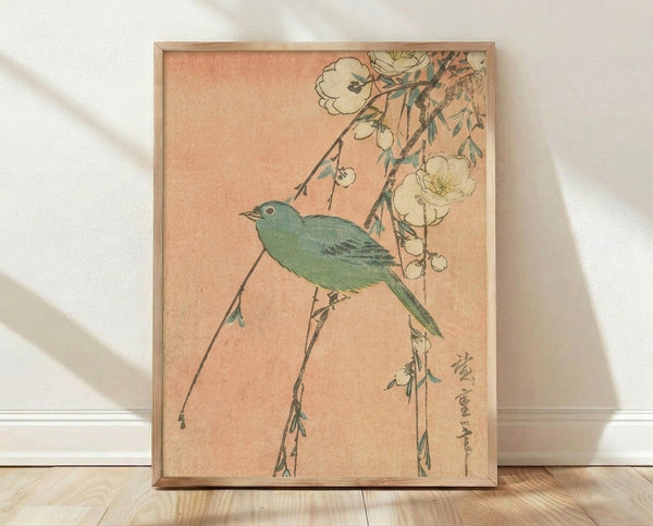 Framed Japanese woodblock poster featuring a serene bird perched on a flowering branch with delicate peach blossoms, sage green leaves, and charcoal linework on cream background.