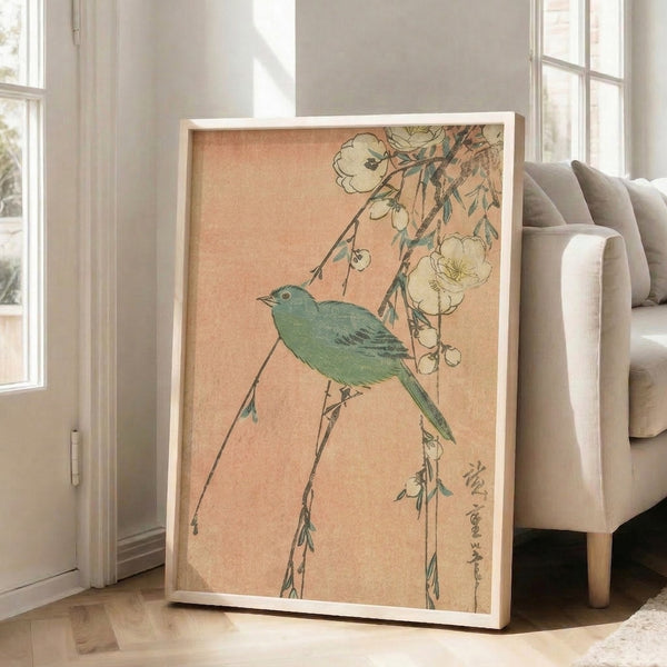 Serene botanical poster showing a bird with cherry blossoms and leaves in soft peach and sage tones, framed in Japanese woodblock art style.