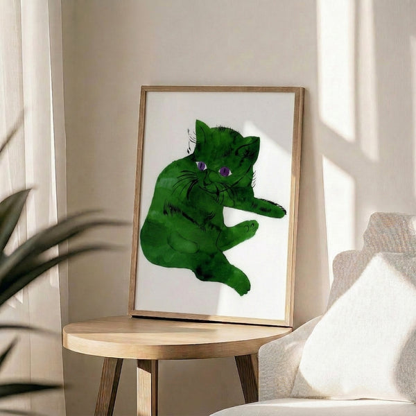 Framed modern art print depicting a cat in vivid green hues with simplified, high-impact pop art styling and dramatic color contrast.