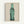 Green Coca-Cola bottle pop art print displayed as a framed poster, minimalist design with striking color contrast and contemporary aesthetic.