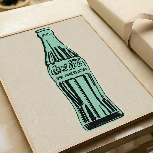 Framed pop art wall print depicting a luminous green Coca-Cola bottle, modern minimalist design with striking visual impact and bright hues.