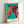 Striking animal print featuring a zebra in saturated magenta and cyan tones with yellow accents, modern pop art aesthetic.