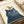 Gold and charcoal bird beside a moody black cat on cream, minimalist folk art line drawing with cozy, humorous character framed as wall art.