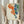 Serene chinoiserie wall art depicting three hanging lantern decorations with flowing fringe in a vintage palette of cream, navy blue, forest green, and rust orange.