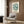 Modernist abstract wall art print with subtle teal and sage green strokes on cream background, evoking contemplative organic forms.