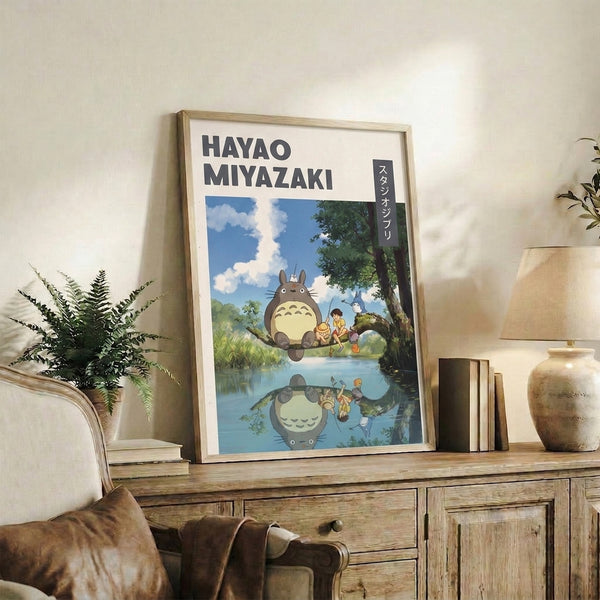 Studio Ghibli-inspired wall art of an endearing forest spirit and companion near water, rendered in peaceful tones of cream, soft green, sky blue, and warm brown.