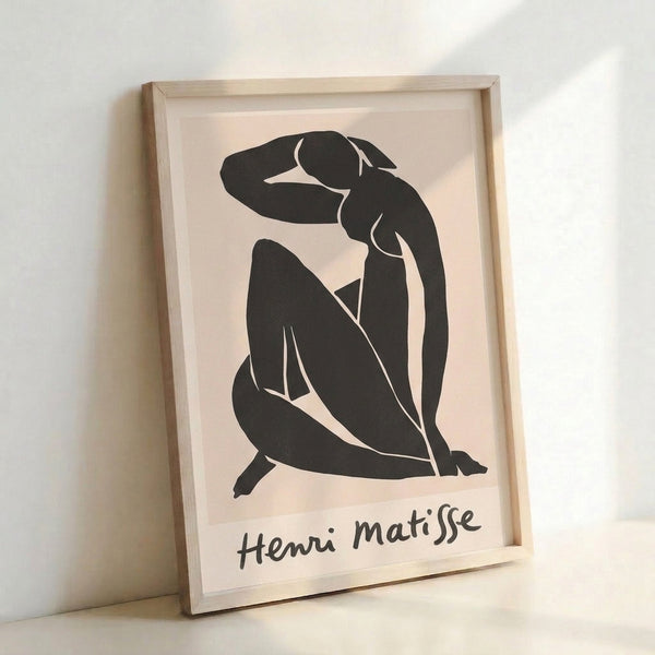 Abstract seated figure in minimalist black line work and organic shapes on cream, inspired by mid-century modernist cut-paper techniques.