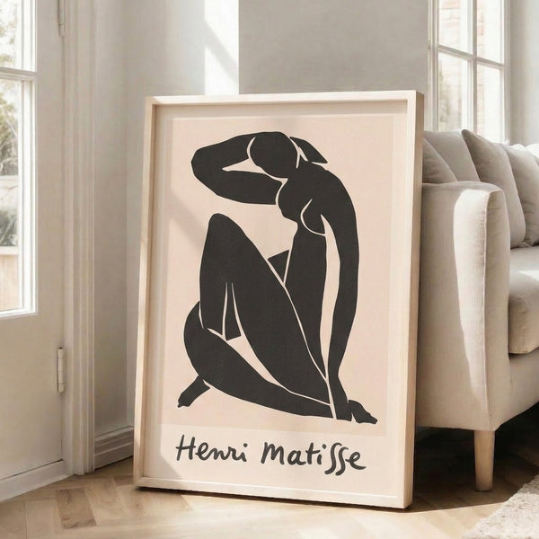 Contemporary minimalist poster of a graceful seated female silhouette drawn with expressive black lines in a Matisse-inspired aesthetic.