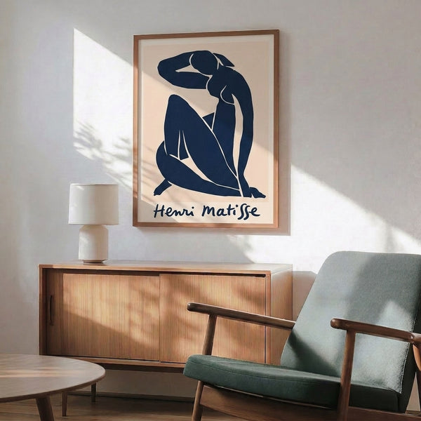 Abstract figure study in black and cream showing a reclining woman through modernist line art and organic form composition.