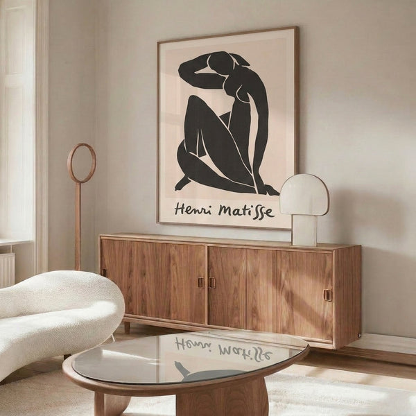 Contemplative line art poster displaying a graceful female silhouette in bold black strokes against a light neutral background.