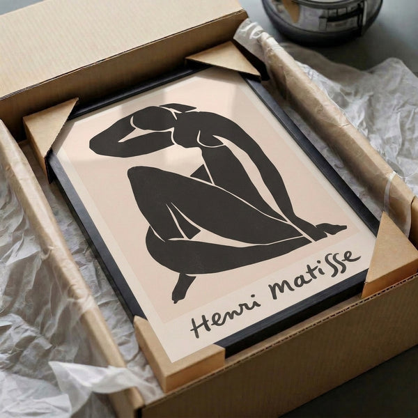 Serene minimalist artwork of a woman in repose, portrayed with flowing black lines and simplified form on a cream poster.