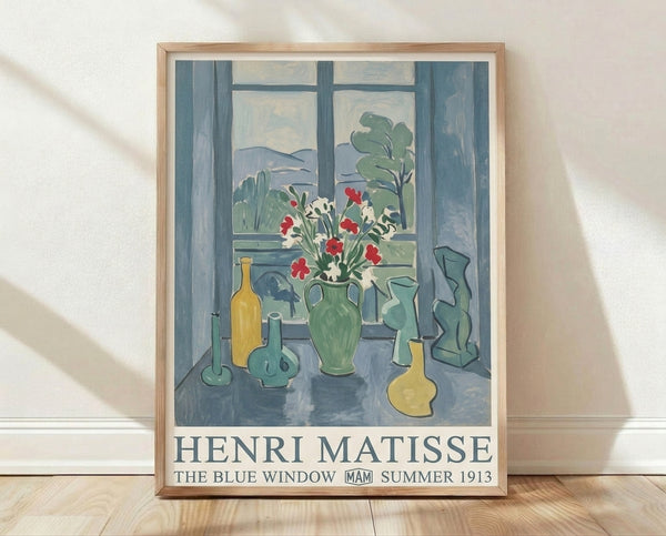 Matisse's The Blue Window, a serene modern interior scene featuring a vase of flowers and potted plant on a table, rendered in soft teal blue, pale yellow, and sage green tones.