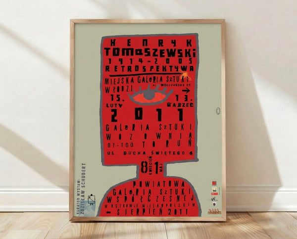 Bold Bauhaus retrospective poster featuring a striking red eye with geometric text in black and gray, exemplifying 1960s minimalist design principles.