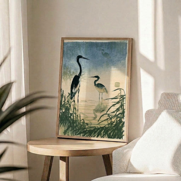 Framed minimalist poster of a blue heron in a misty wetland setting, combining japandi design with muted earth tones and peaceful, wabi-sabi sensibility.