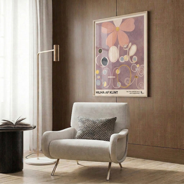 Modernist framed art displaying mystical circular and spiral flower forms rendered in soft mauve, peach, and cream with touches of mustard yellow for a balanced, harmonious composition.