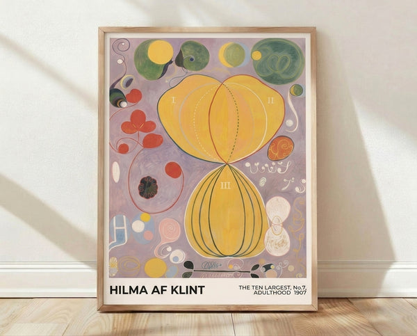 Abstract framed poster featuring concentric circles and organic spiral forms in pale purple, golden yellow, sage green, and coral red on cream background, creating a contemplative spiritual mood in minimalist art nouveau style.