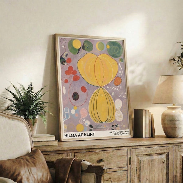 Minimalist abstract wall print featuring interconnected circles and organic spiral leaf forms in cream, sage green, coral red, and golden yellow creating contemplative sacred geometry.
