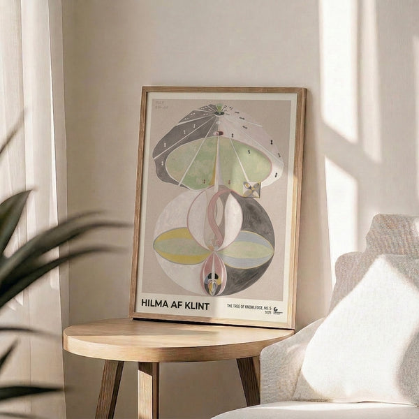 Abstract composition of botanical forms and geometric shapes rendered in cream, mauve pink, and soft sage tones, framed as sophisticated wall art.
