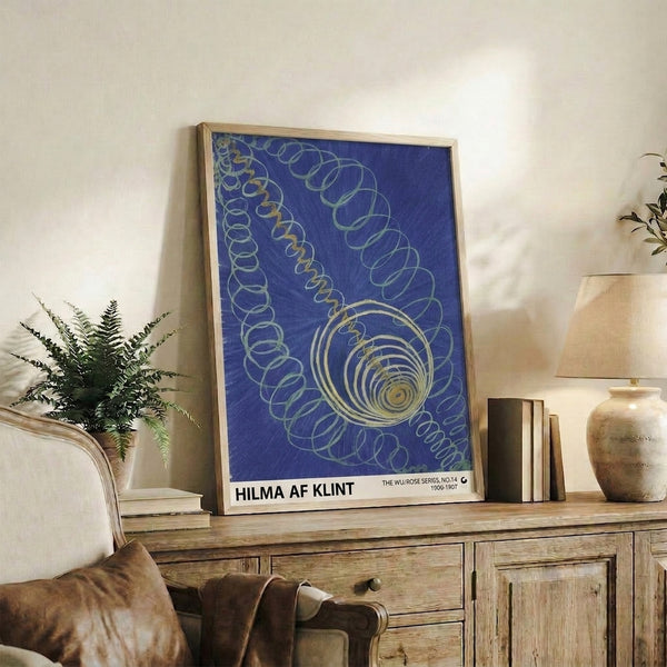 Abstract wall print with layered spiral geometry in cool blue and warm gold tones, designed with wabi-sabi principles for a harmonious, introspective effect.