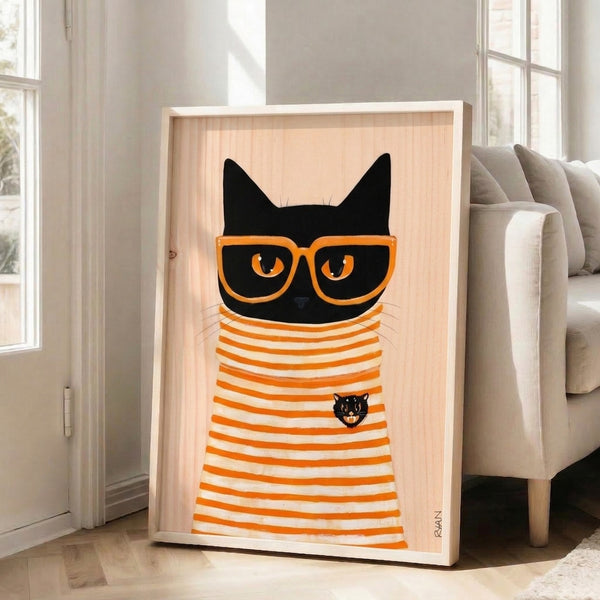 Framed modern art print of a cool black cat sporting oversized orange frames, combining playful humor with sophisticated minimalist design.