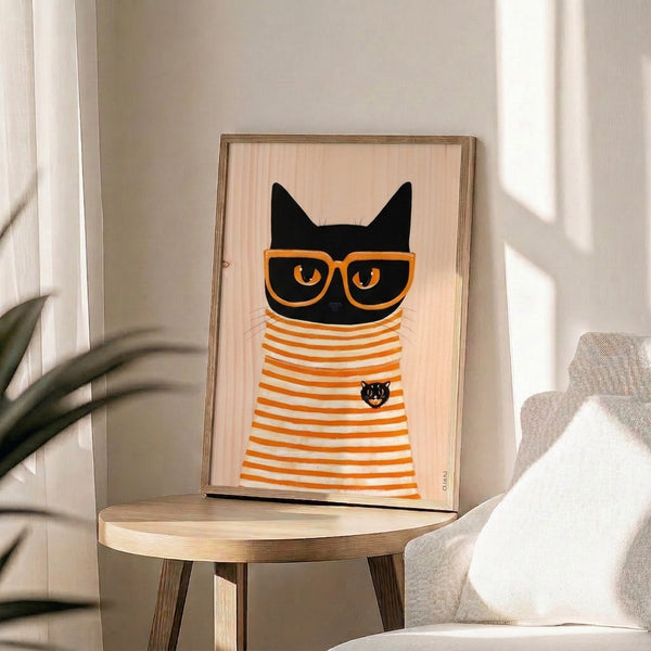 Retro-style poster art showcasing a chic black kitten in bold orange glasses against a cream backdrop, hung on a wall.