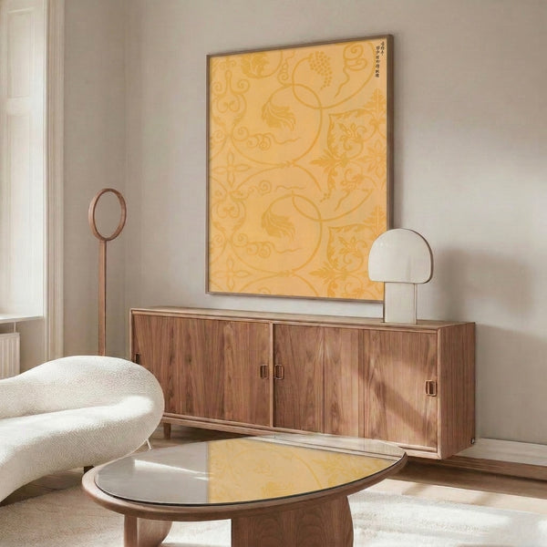 Refined minimalist woodblock-inspired print displaying intricate cream and gold patterning with meditative Asian cultural motifs in a wall frame.