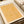 Japandi decorative art featuring ethereal ochre and cream ornamental designs with flowing scrollwork, capturing the quiet elegance of traditional Japanese aesthetics.