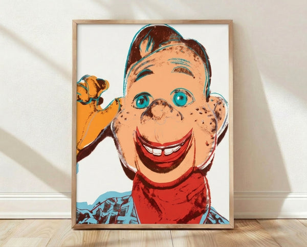 Pop art style portrait of Howdy Doody with bold graphic lines and vibrant colors on a white background, displayed as a framed poster.