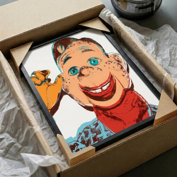 High-contrast pop art style poster of Howdy Doody in saturated colors, framed and hung as contemporary wall art.