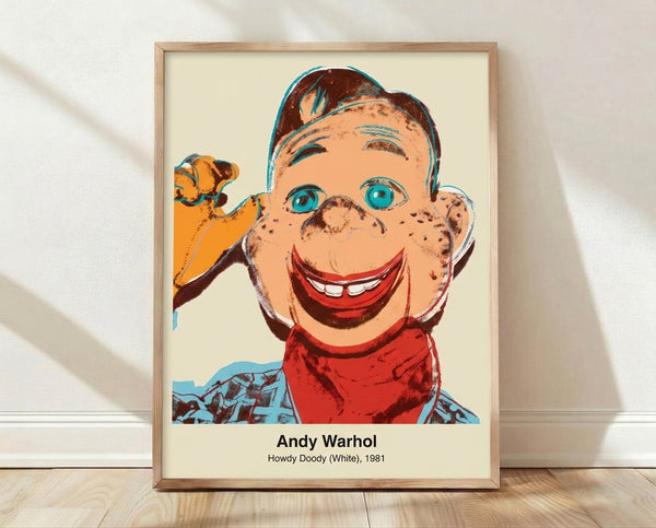 Pop art poster of Howdy Doody marionette in white and black, Warhol-style iconic puppet portrait with nostalgic retro aesthetic framed on wall.