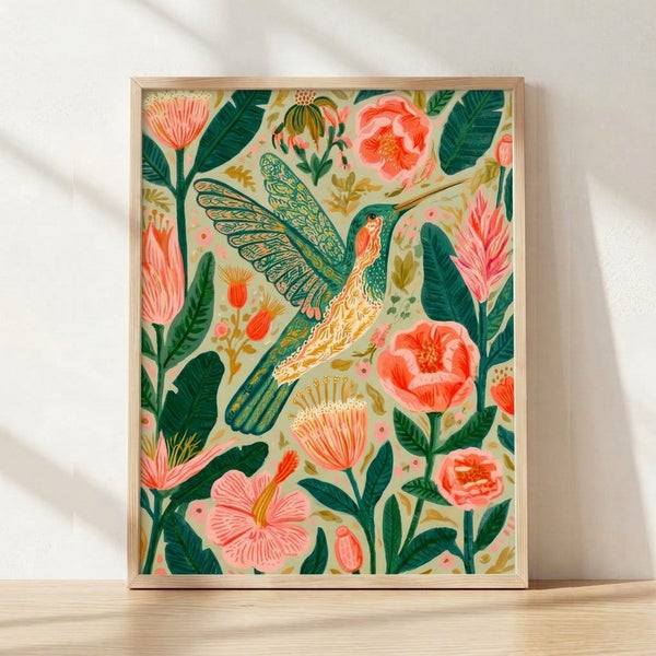 Watercolor hummingbird hovering among blooming peonies and botanical leaves in coral pink, teal green, and golden ochre tones, framed as a boho art print on a wall.