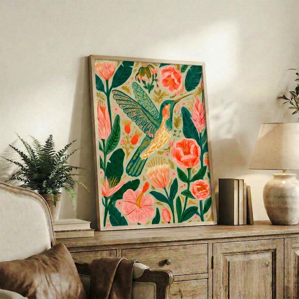 Boho watercolor garden scene with a hummingbird among vibrant peonies and flowering plants in soft cream, pink, and teal green, presented as a framed wall art piece.