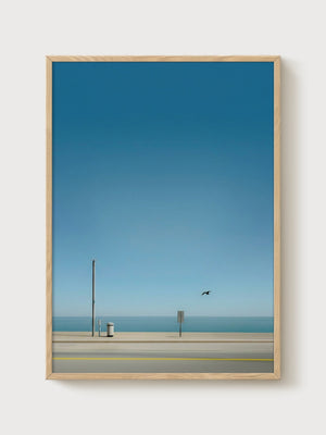 Minimalist Ocean Wall Art poster in oak frame