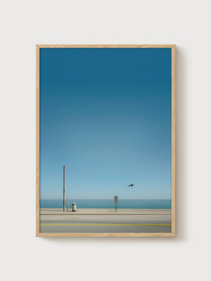 Minimalist Ocean Wall Art poster in oak frame
