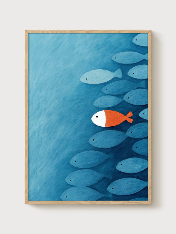 Lone Orange Fish Wall Art poster in oak frame