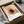 Framed modern abstract print with overlapping circular forms in a harmonious palette of cream, sage, and warm tones, embodying contemplative minimalism and Japanese aesthetic philosophy.