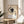 Japandi-style wall art with contemplative composition of overlapping brushstroke circles in black, grey, and cream, evoking zen balance and purpose.