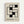Framed geometric poster with black interlocking rectangular shapes forming an abstract pattern on cream textured background. Features "BAUHAUS" and "EXHIBITION JULY 23, 1923" text at bottom in black sans-serif font. Light wood frame against white wall with subtle shadow.