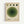 A framed poster with geometric green circles in varying shades from light olive to dark forest green arranged concentrically on cream paper. Four small circles at the top progress from light to dark green. Text at bottom reads "bauhaus" and "JUNE 17, 1921" in simple black font. The artwork has a minimalist, mid-century modern aesthetic with clean lines and is displayed in a natural wood frame against a white wall.