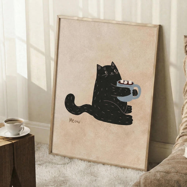 May include: Framed poster print leaning against white wall in cozy room setting with natural light. Features cute black cat illustration holding blue mug with marshmallows, word "Meow" below, on beige textured background. Light wood frame, displayed on white fluffy rug near wooden side table with coffee cup and blanket.