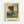 May include: Framed art print of an Impressionist landscape painting mounted on white wall. The artwork shows a winding dirt path through countryside with tall leafy trees, rolling green hills, and warm golden sunset sky. Painting features soft brushstrokes in muted earth tones of greens, yellows, and browns. Simple light wood frame with white matting displays the vintage pastoral scene.